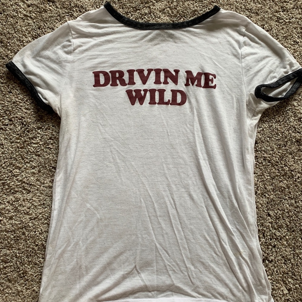 Plain T-shirt with “drivin me wild” on it